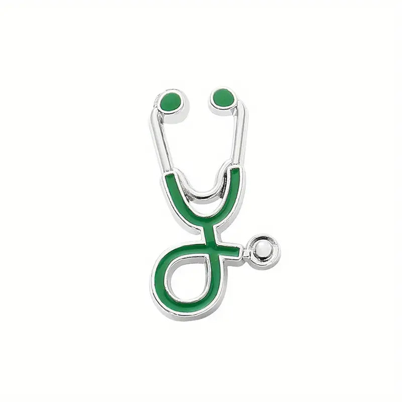 silver and green Stethoscope Enamel Pin